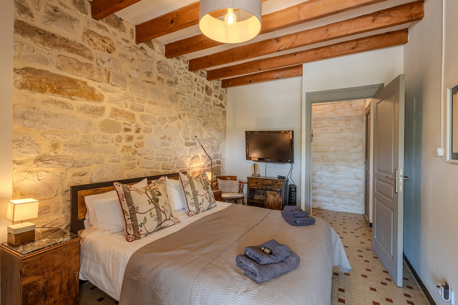 Chambre au rez-de-chaussée | Maison de vacances à Soturac